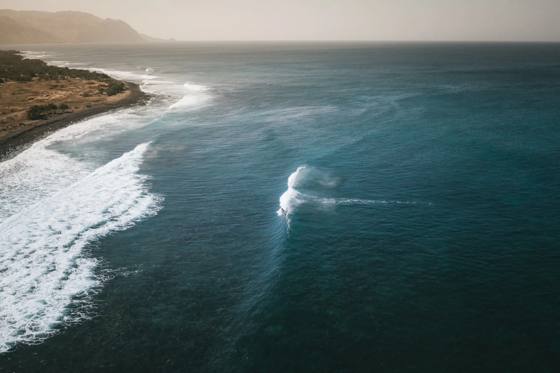 Aerial surfer carving