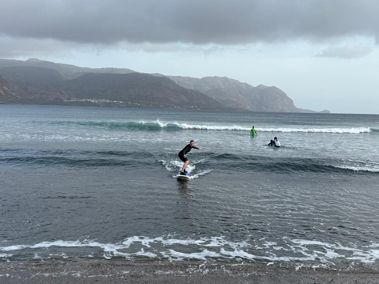 Surfer catching a wave at Tarrafal